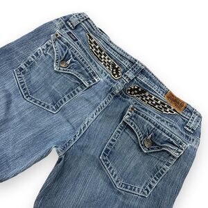 Adiktd Y2K low rise flare jeans with black & white checkered rhinestone wings